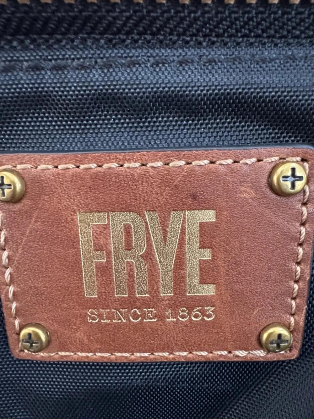 Frye Black Backpack with Brown Leather Accents and Gold Hardware